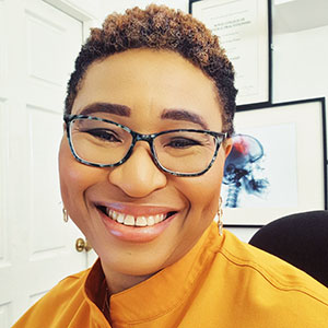 Headshot of Dr Sylvia Kama-Kieghe, GP and advocate