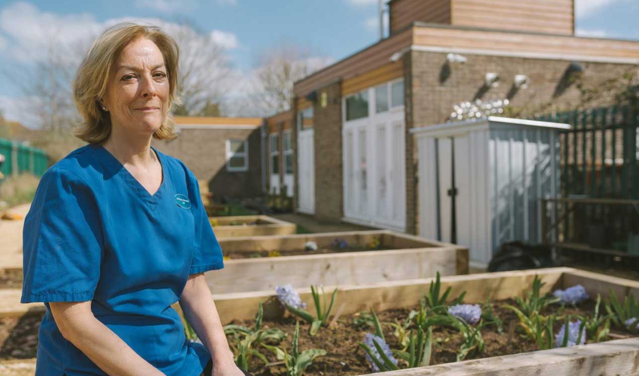 An image of Dr. Kirsty Alexander sitting outside