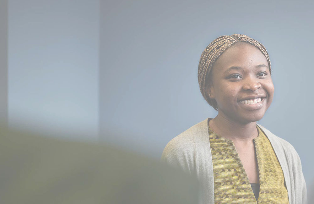 A woman looking and smiling