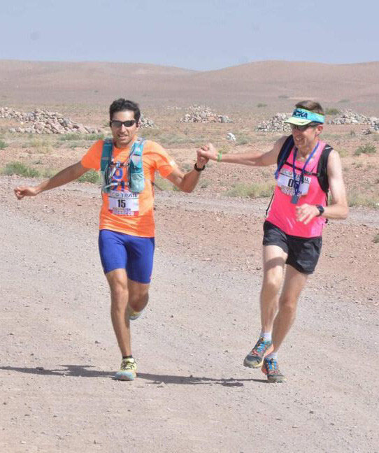 Hussain Al Zubaidi on a run with a companion