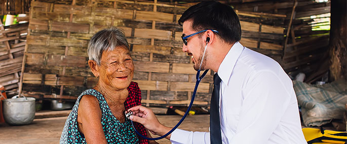 Woman being checked by a GP