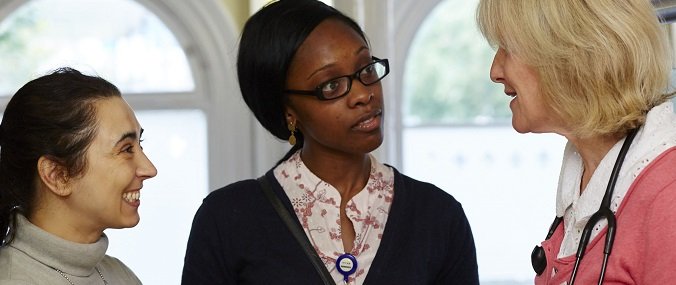 Three women in conversation